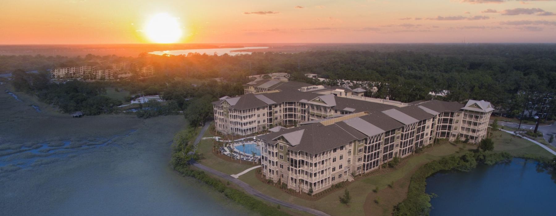 a building next to a body of water