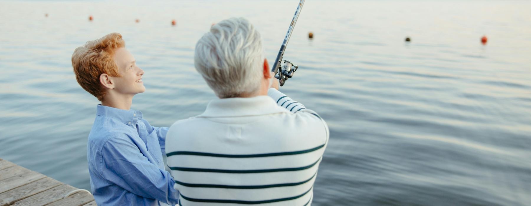 a person and a boy fishing